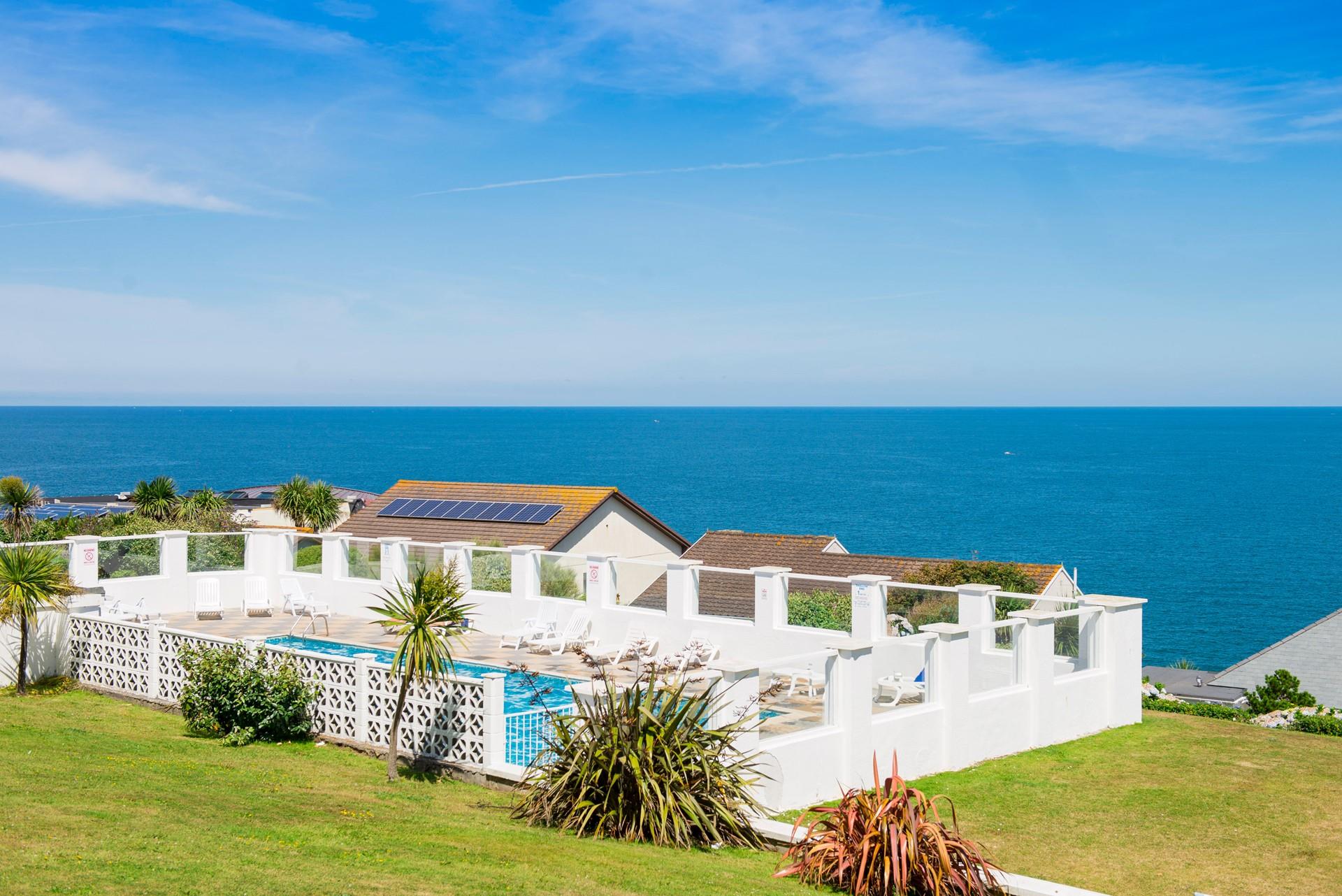 Cool off with a dip in the pool after a day of sunbathing.