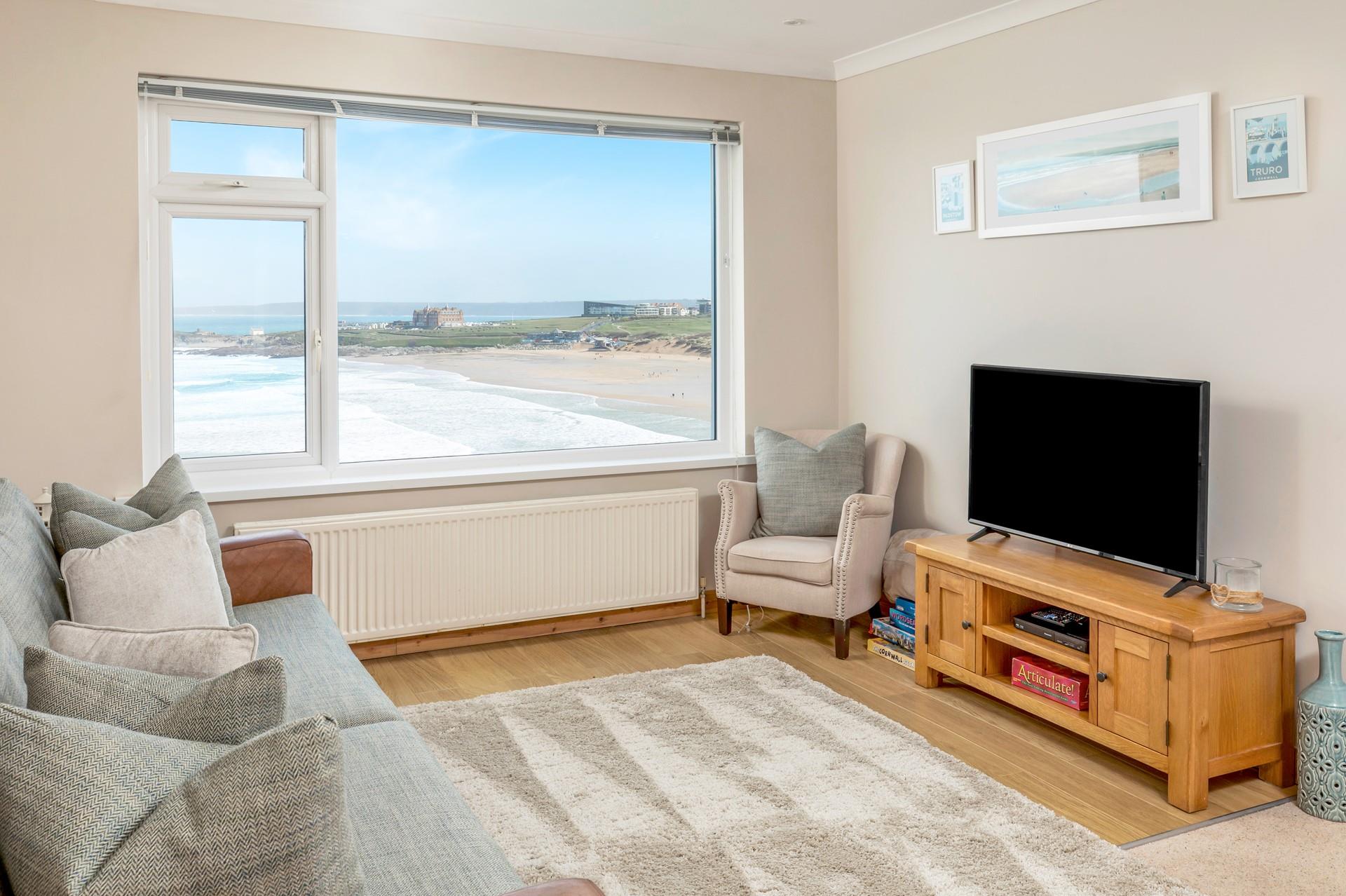 Sink into the sofa and enjoy stunning views of Fistral beach.