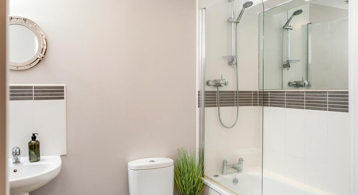 Wash off sandy toes in the shower after a day on the sand.