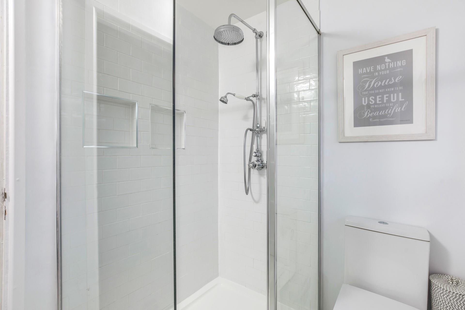 Wash off sandy toes after a day on the beach just 283 steps away!