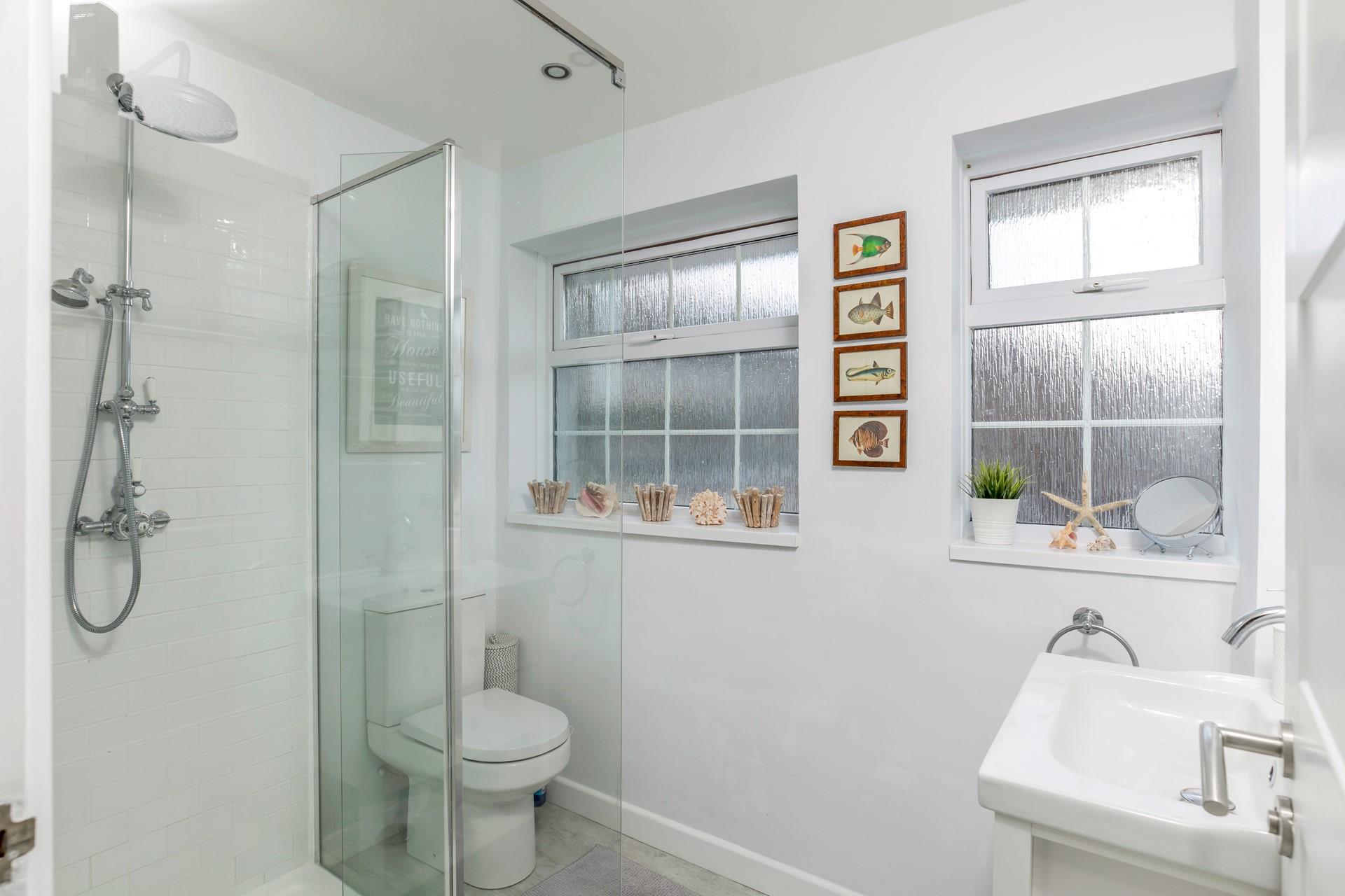The bathroom is modern and is the perfect space to get ready in the morning.