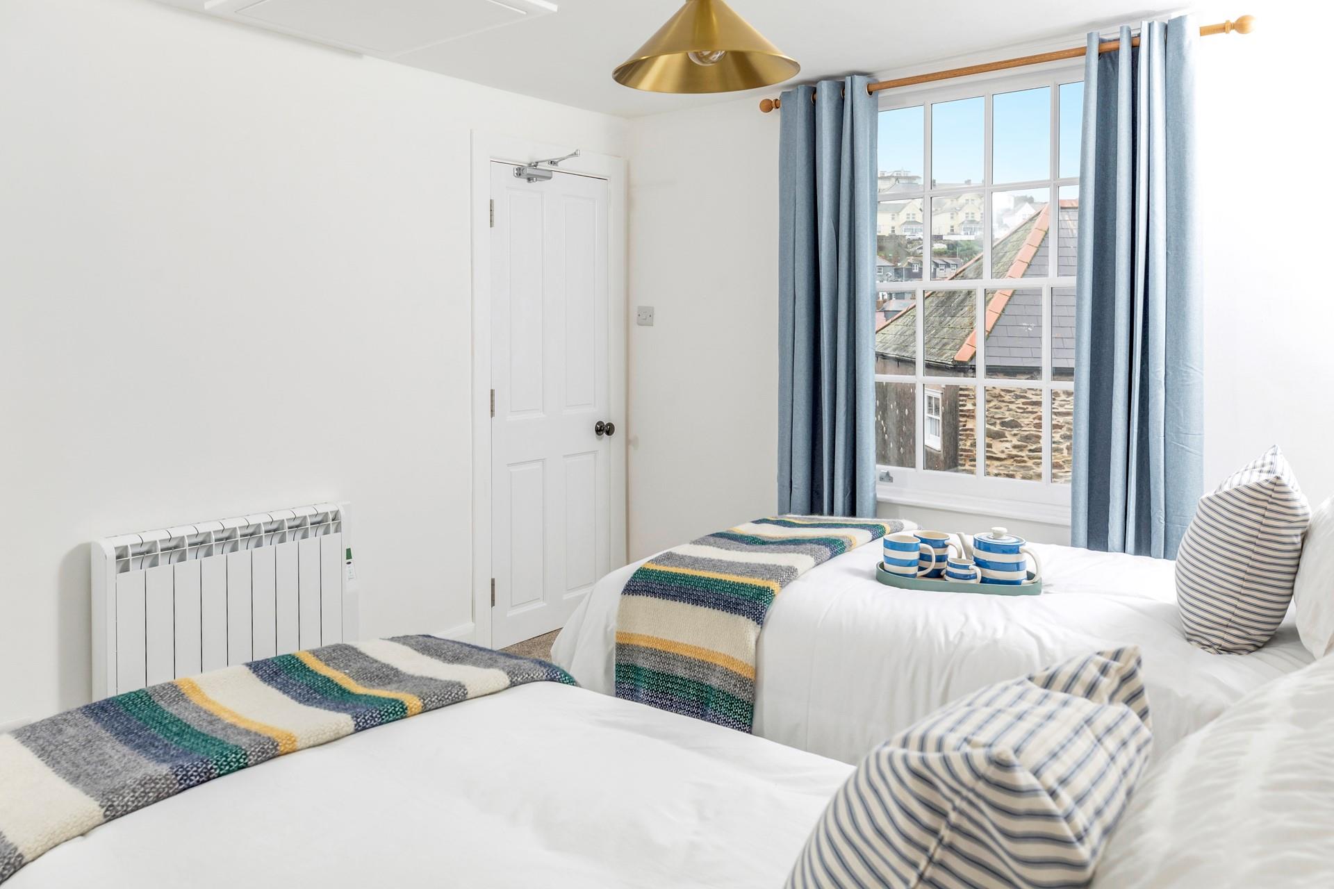 Open the curtains to views of the harbour each morning.