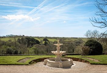 Enjoy the vast countryside views in the garden.