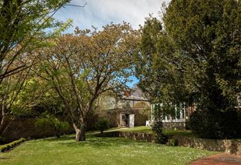 The expansive gardens are perfect for unwinding on sunny days.