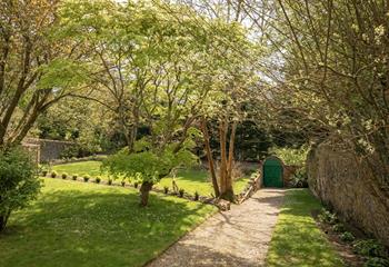 The charming walled garden is a secluded haven for you and your four-legged friend.