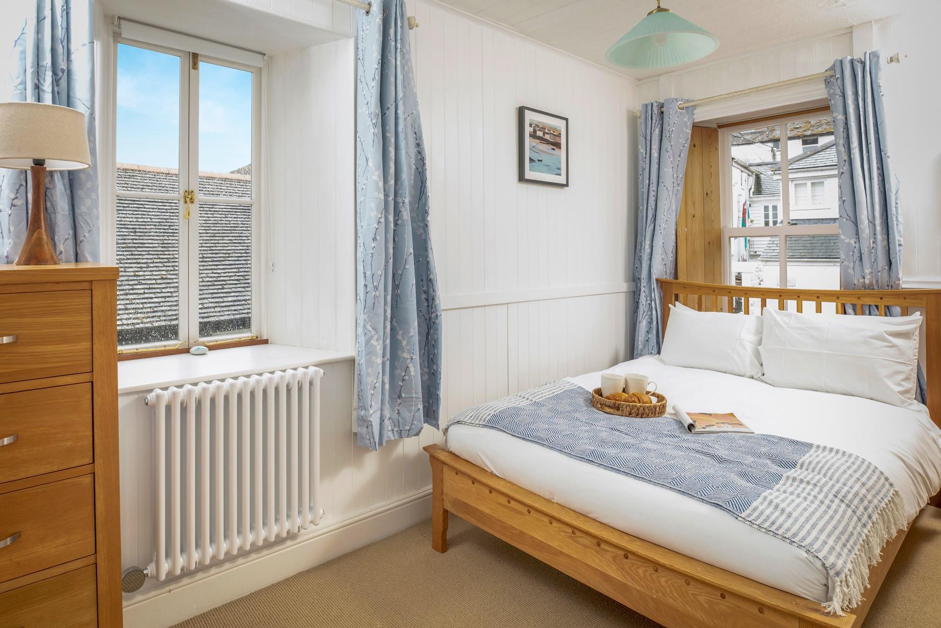 Wake up refreshed and ready for the day in bedroom 1.