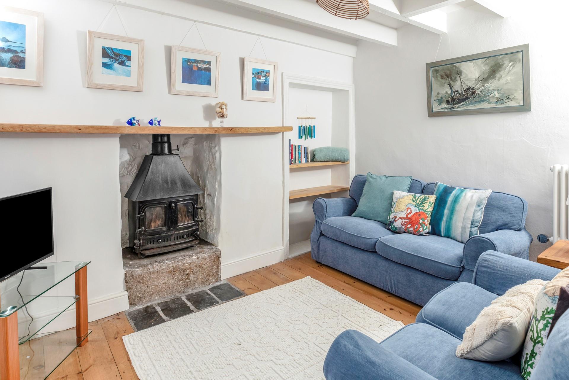 The sitting room is a delightful base to return to each day.