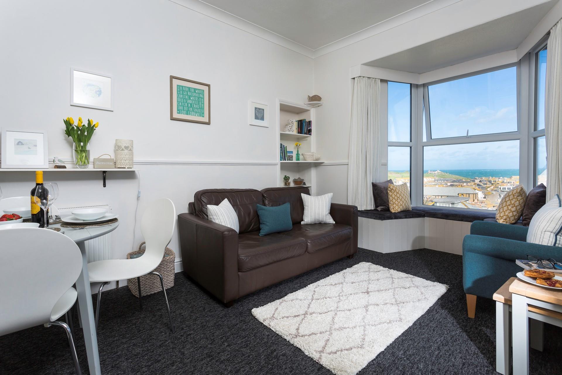 The cosy sitting room is the perfect base to come back to each day.