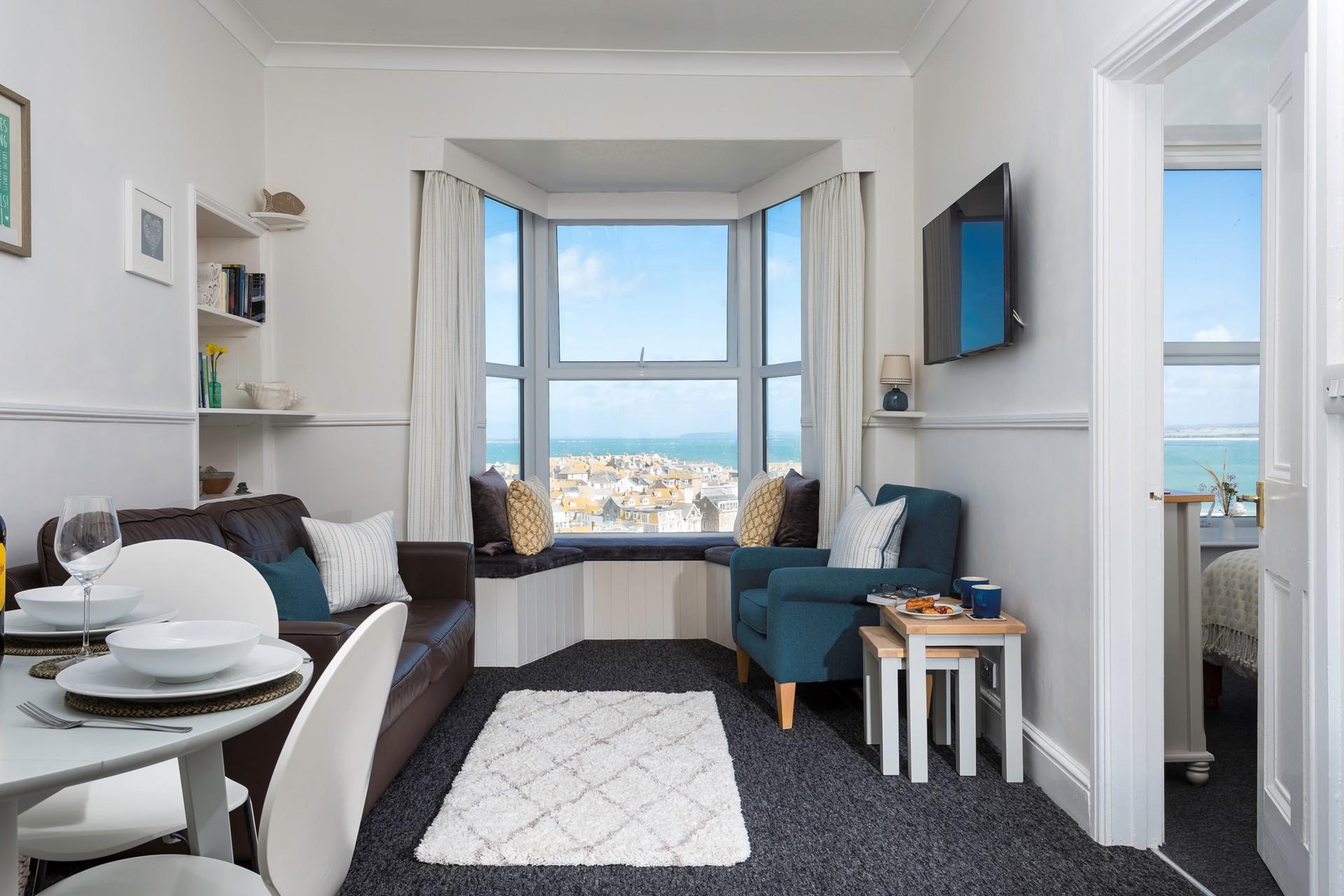 Sit in the window seat and enjoy the view with a cuppa.