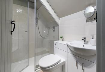 The en suite has a shower for washing off sandy toes after beach days.