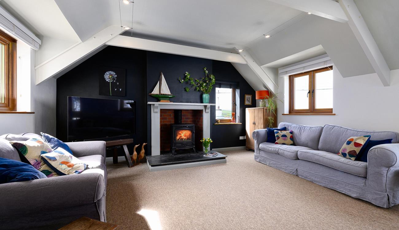 Light the woodburner and spend a cosy evening in the sitting room.