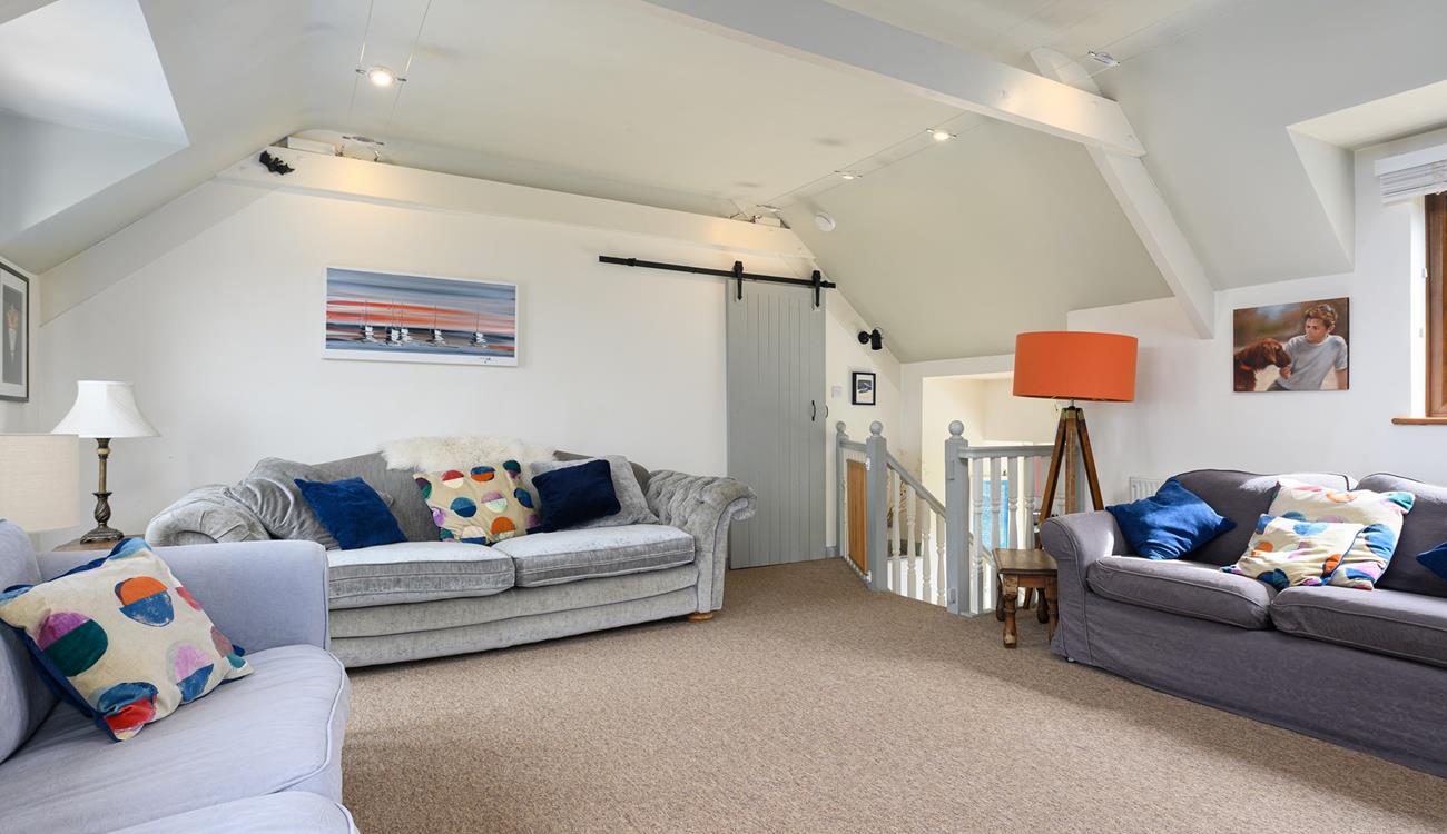 Spend quality time together as a family in the sitting room.