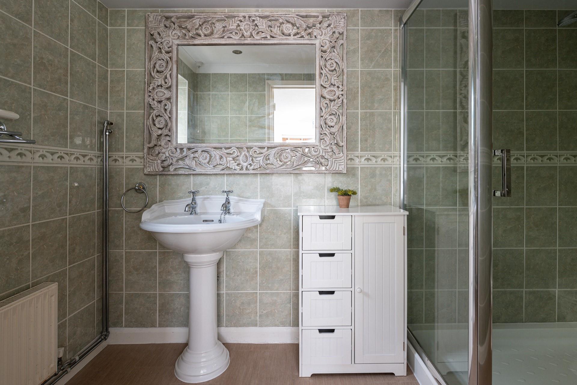 Get ready for the day in the en suite.