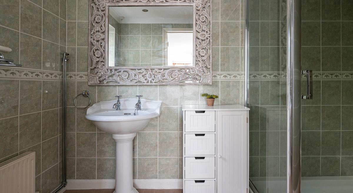 Get ready for the day in the en suite.