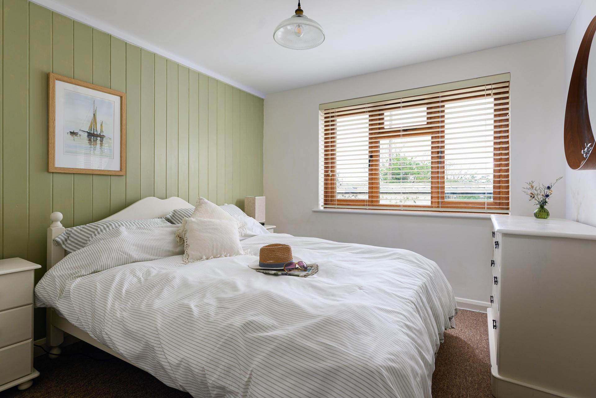 The bedrooms are decorated with calming neutral tones.