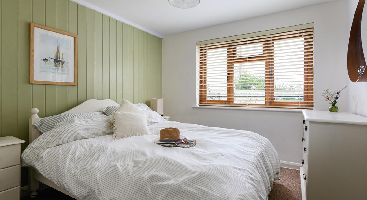 The bedrooms are decorated with calming neutral tones.