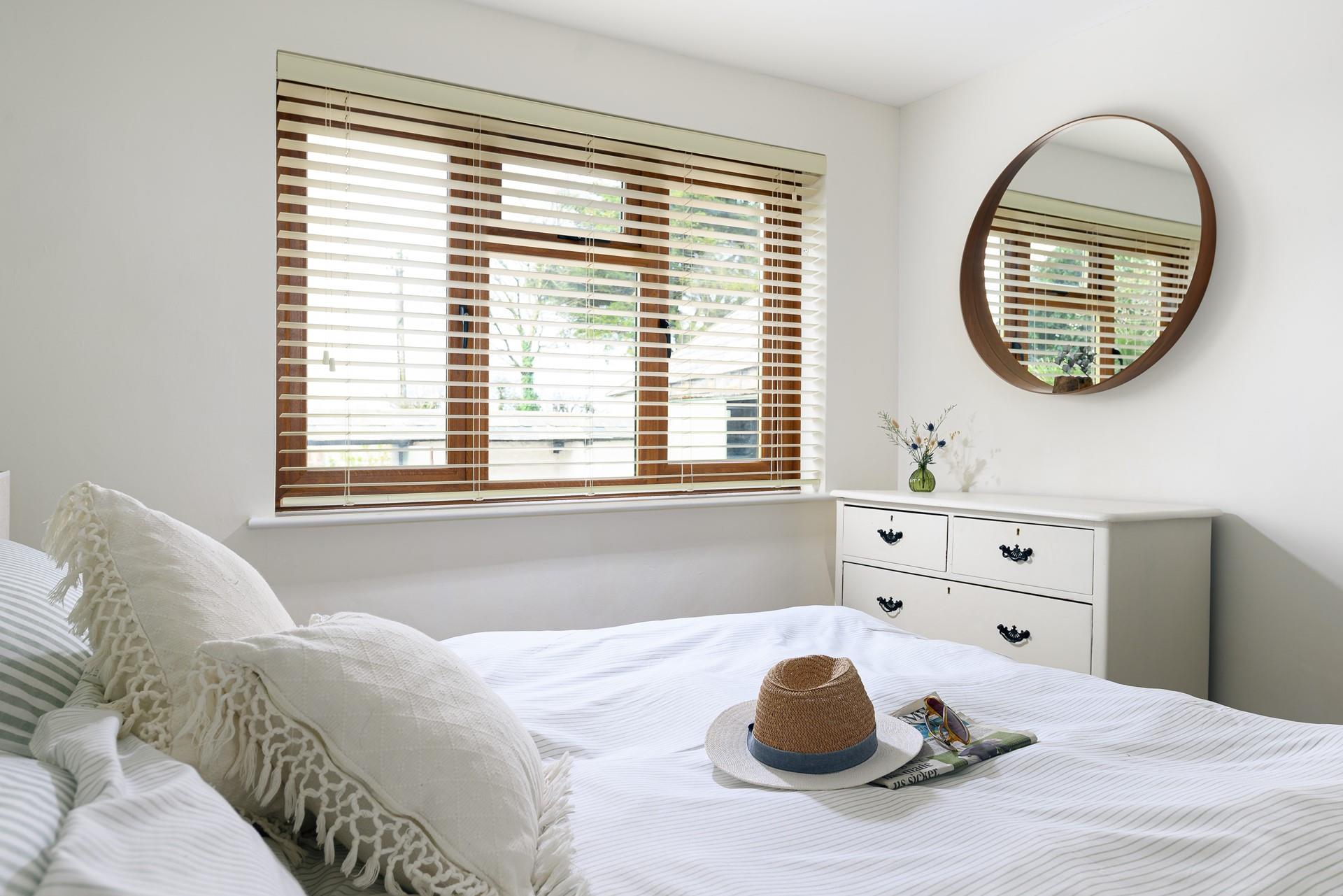 Bedroom 4 has a spacious king size bed for a relaxing night's slumber.