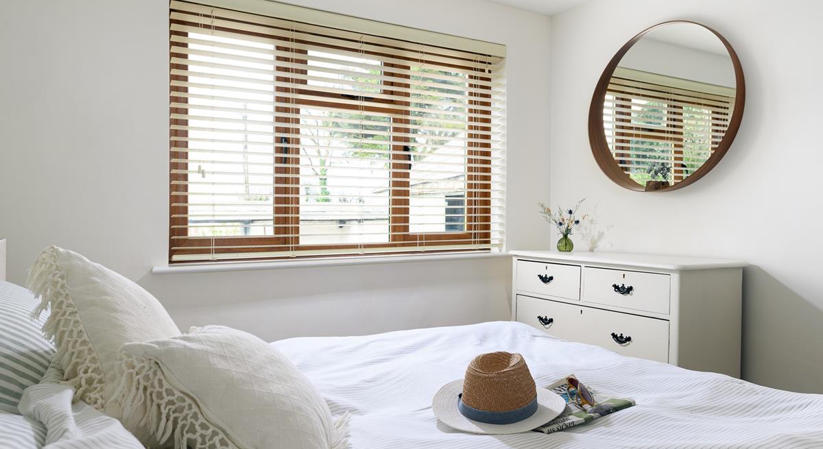 Bedroom 4 has a spacious king size bed for a relaxing night's slumber.