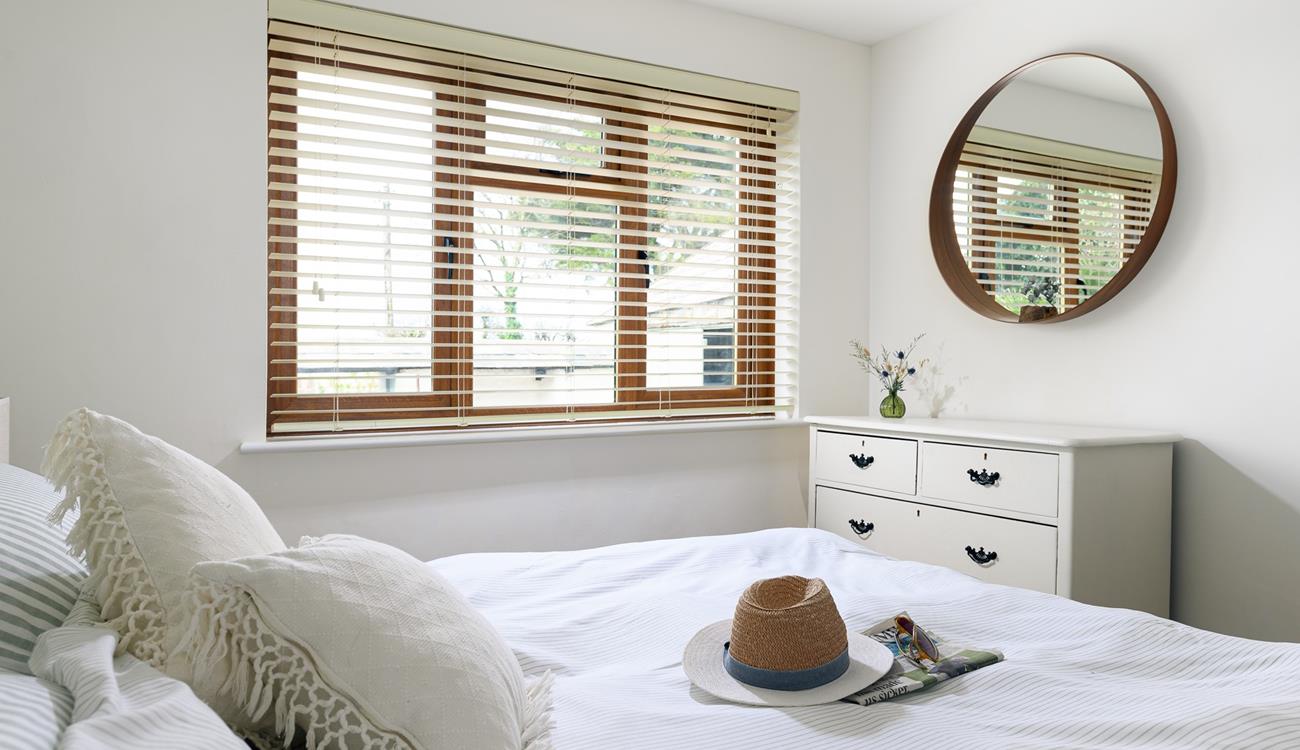 Bedroom 4 has a spacious king size bed for a relaxing night's slumber.