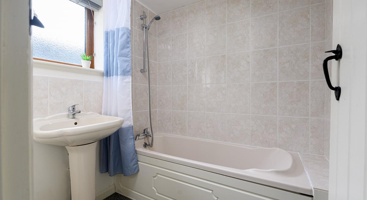 The family bathroom is perfect for a relaxing bath.