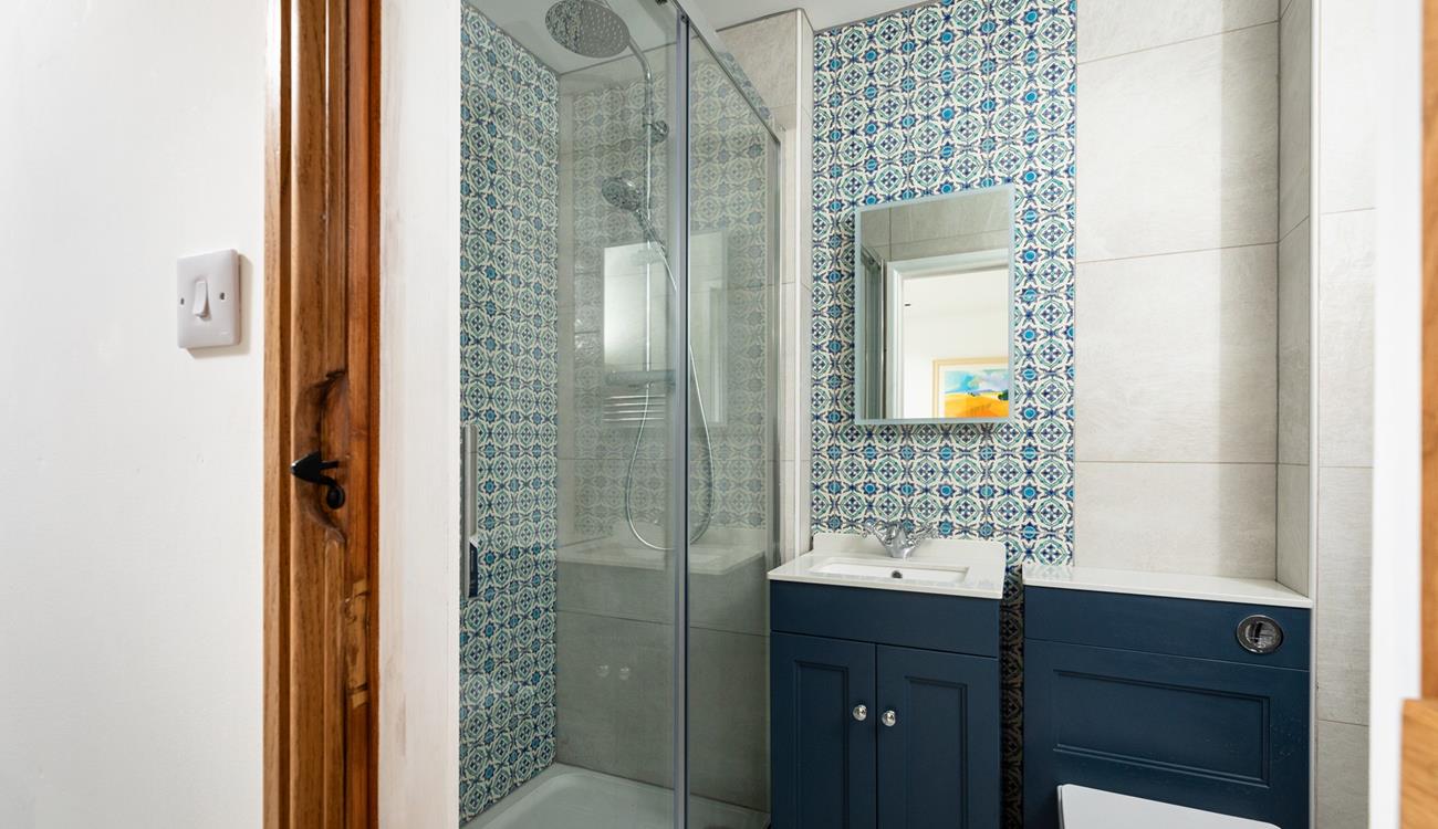 Bright and modern, the second shower is great for families or couples holidaying together.