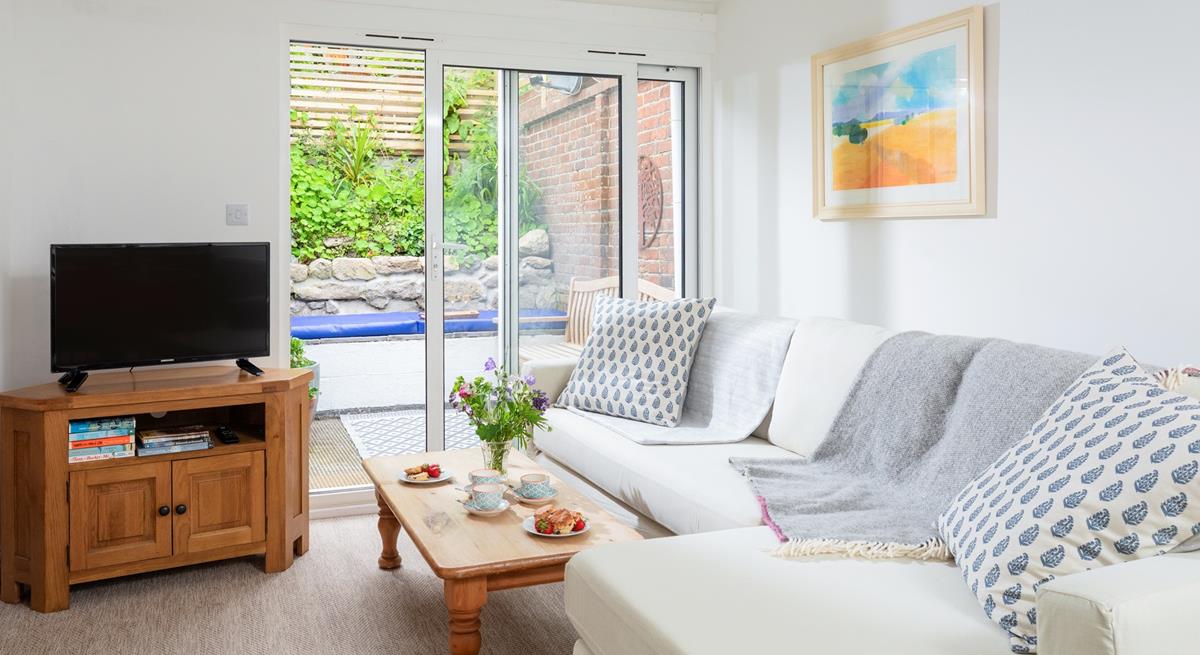 Relax in the tranquil living space, or step outside to the sunny courtyard.