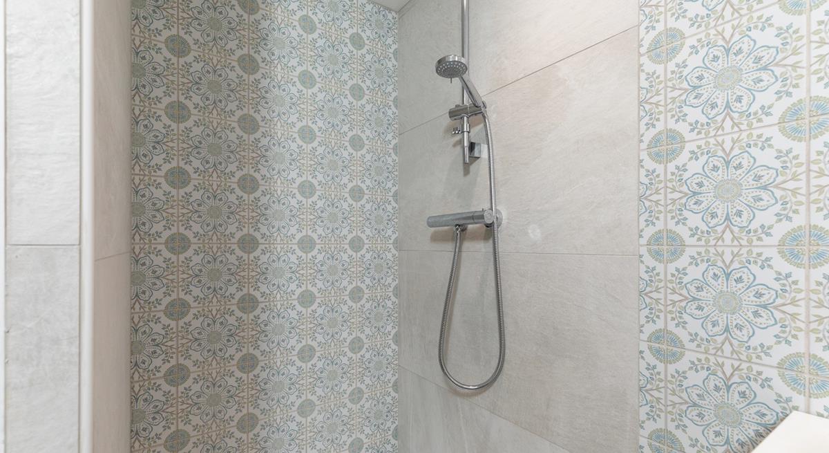 Step into the en suite shower after a day of wandering the nearby coastal paths.