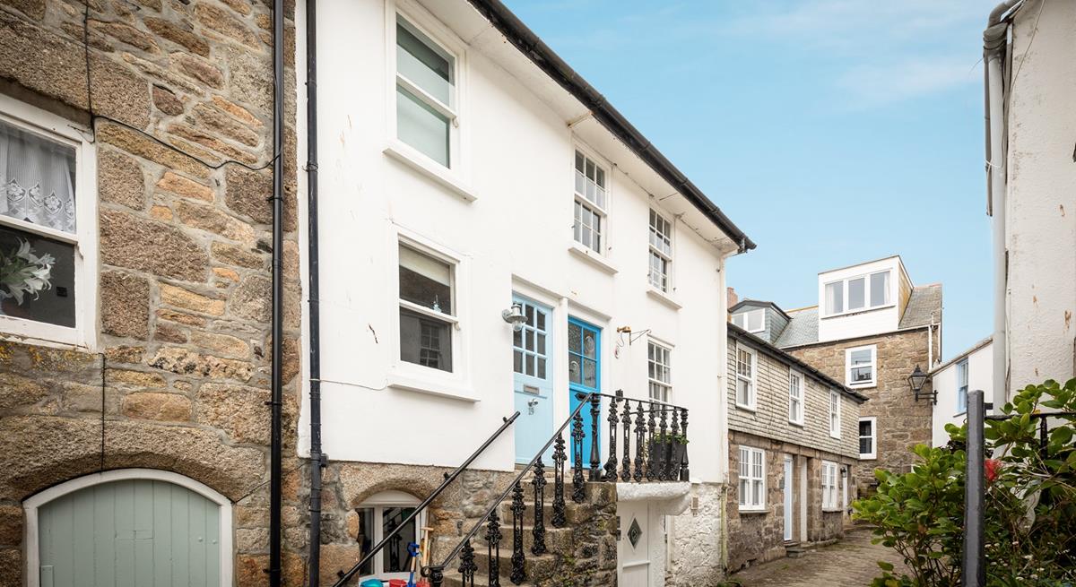 Located just behind Fore Street in a quaint lane, moments from the harbourside.
