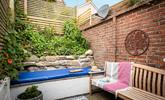 The quaint courtyard is a private suntrap. - Thumbnail Image