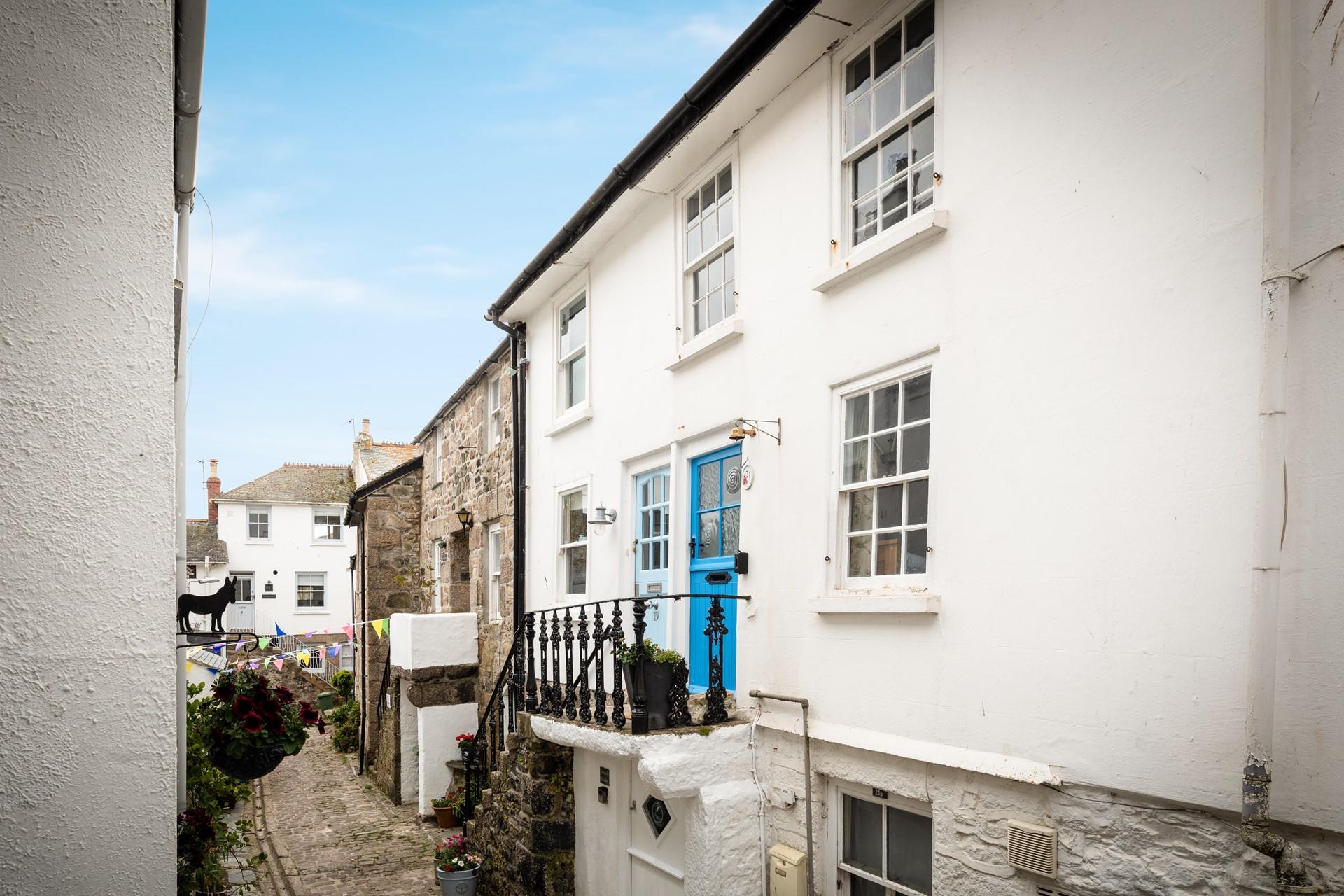Steps up to the cottage take you a world away from the bustling streets of St Ives.