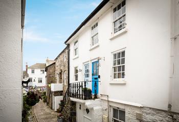 Steps up to the cottage take you a world away from the bustling streets of St Ives.