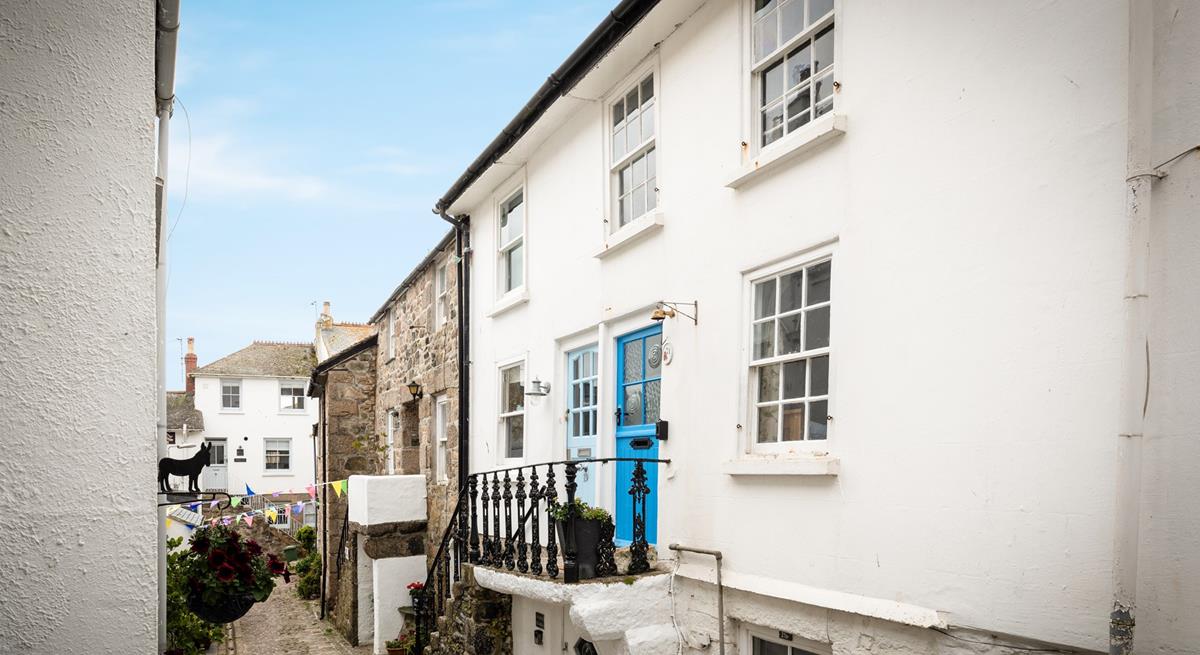Steps up to the cottage take you a world away from the bustling streets of St Ives.