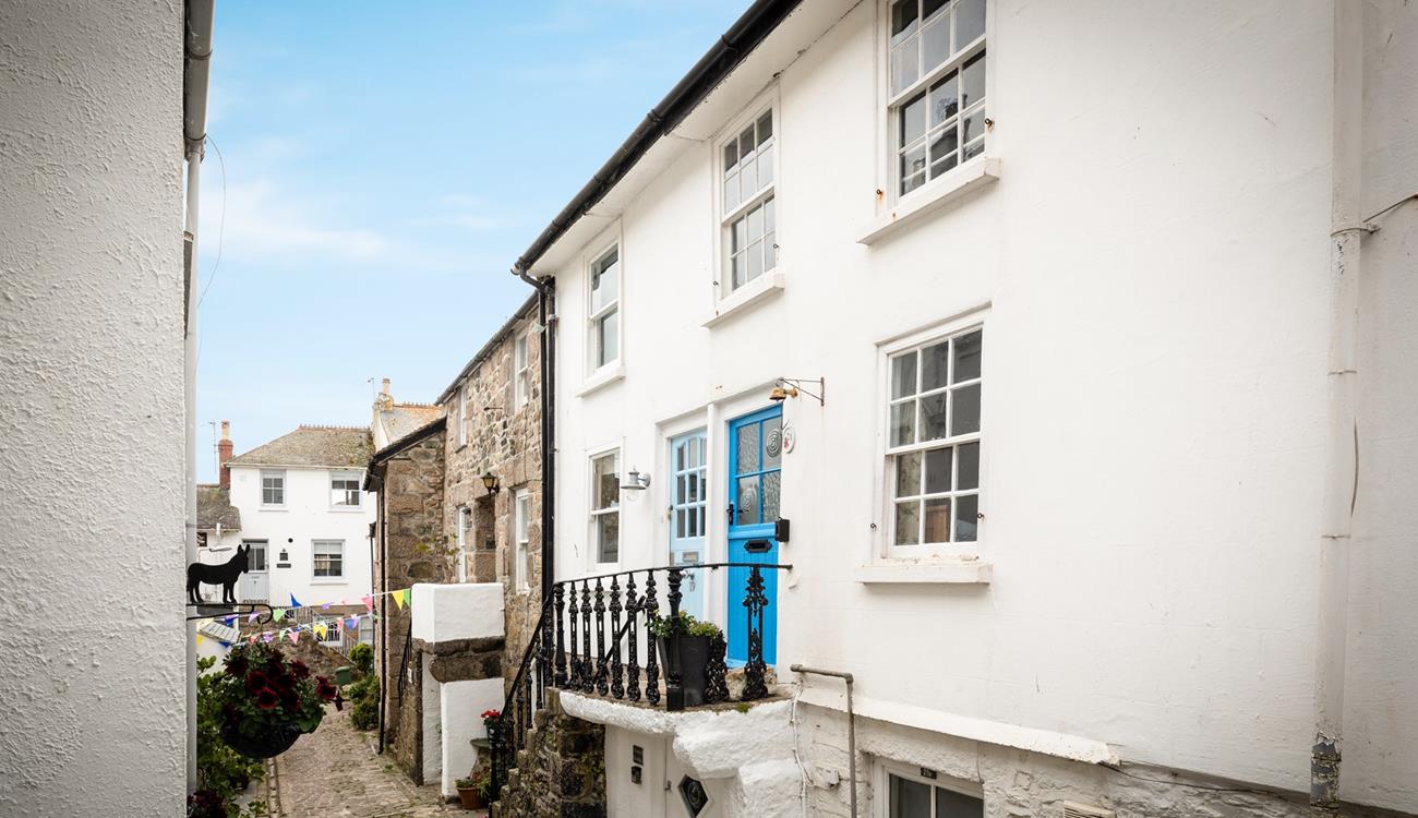 Steps up to the cottage take you a world away from the bustling streets of St Ives.