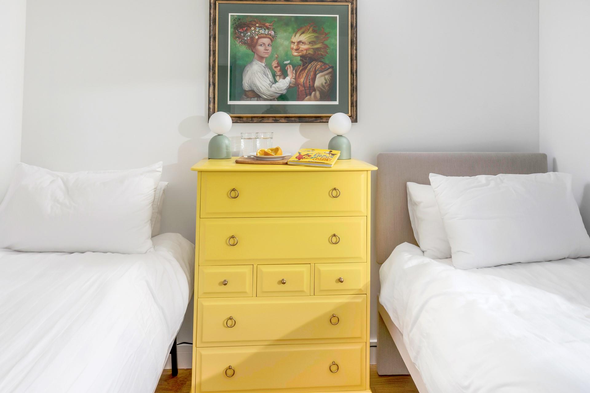 Bedroom 4 has twin beds for additional guests.