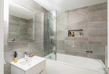 Run a relaxing bath full of bubbles in the family bathroom.