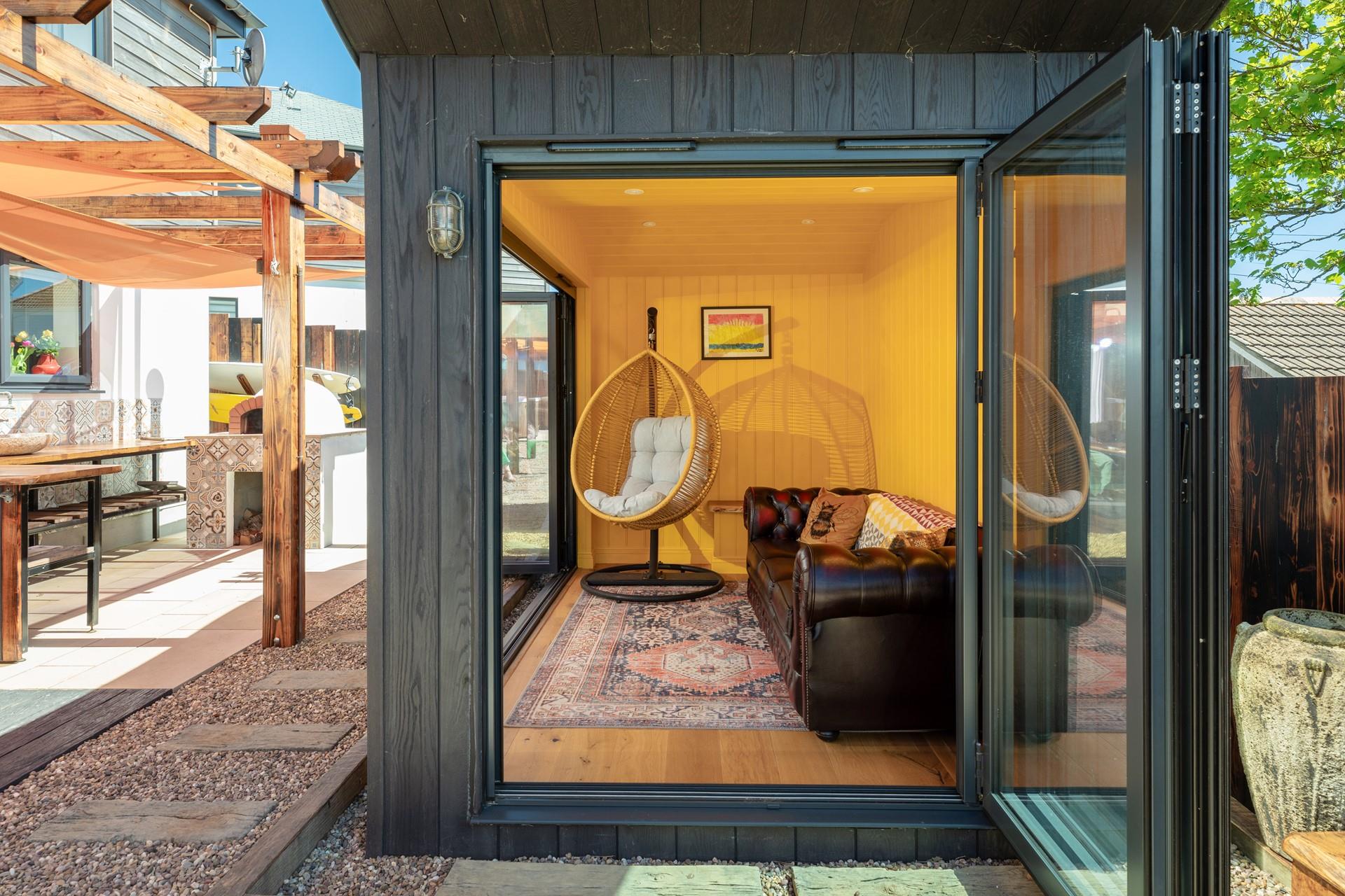 Enjoy your morning cuppa in the colourful garden room.