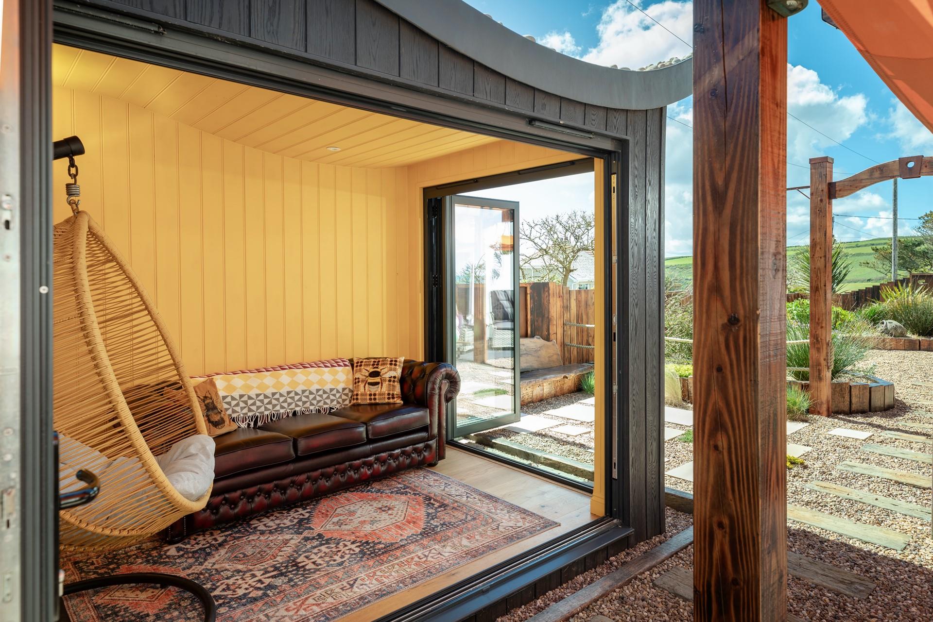 On chilly evenings, you can still enjoy the outside in the comfort of the garden room.