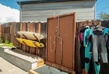 The outside shower is perfect for washing off wetsuits, surfboards and sandy toes!