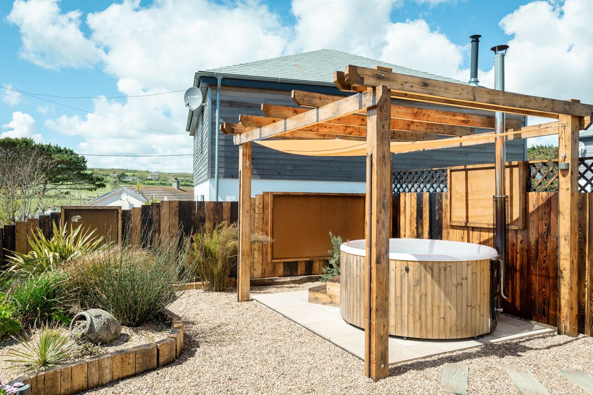 Take a relaxing dip in the woodfired hot tub as the sun goes down.