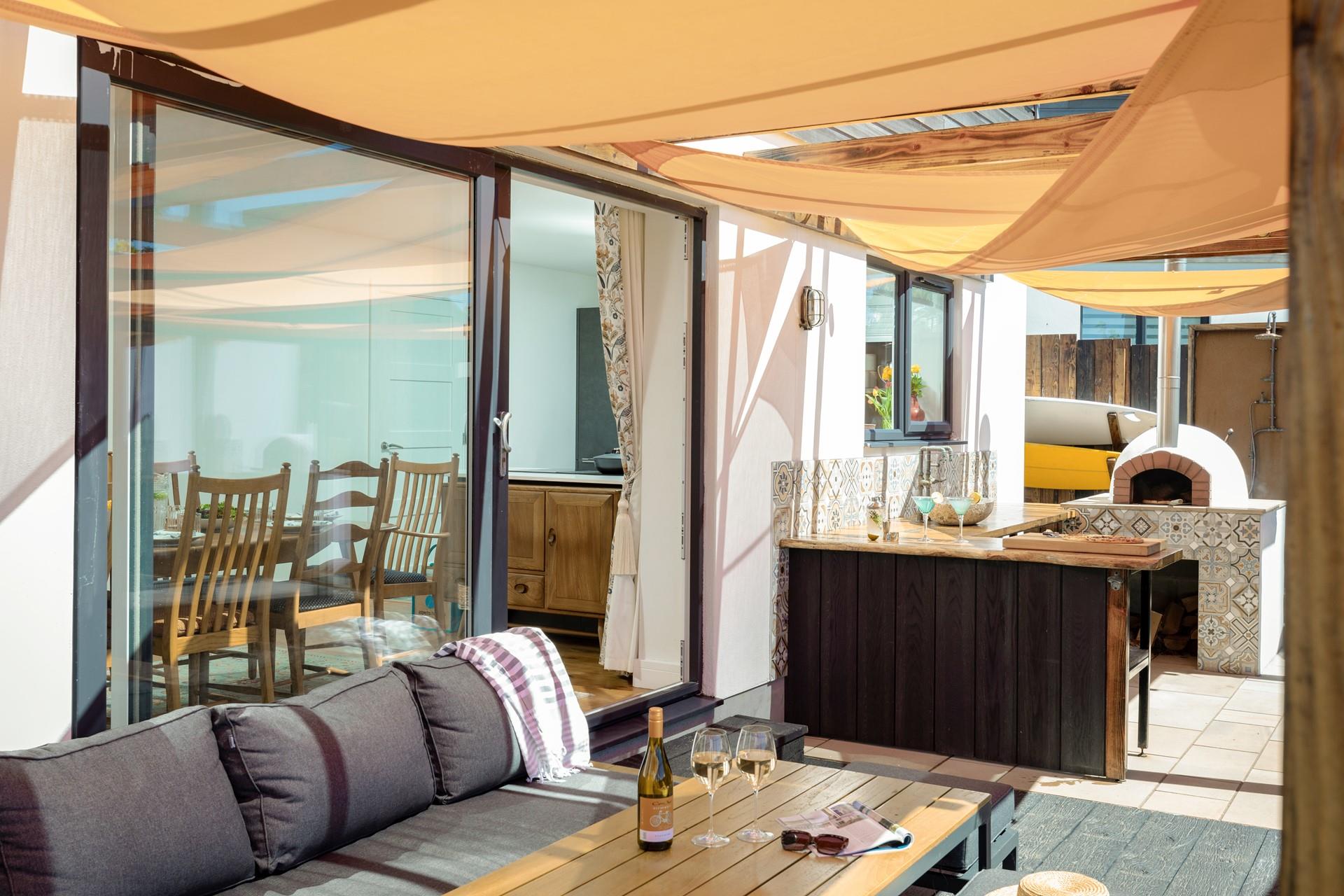 Slide open the patio doors for the perfect combination of indoor and outdoor living.