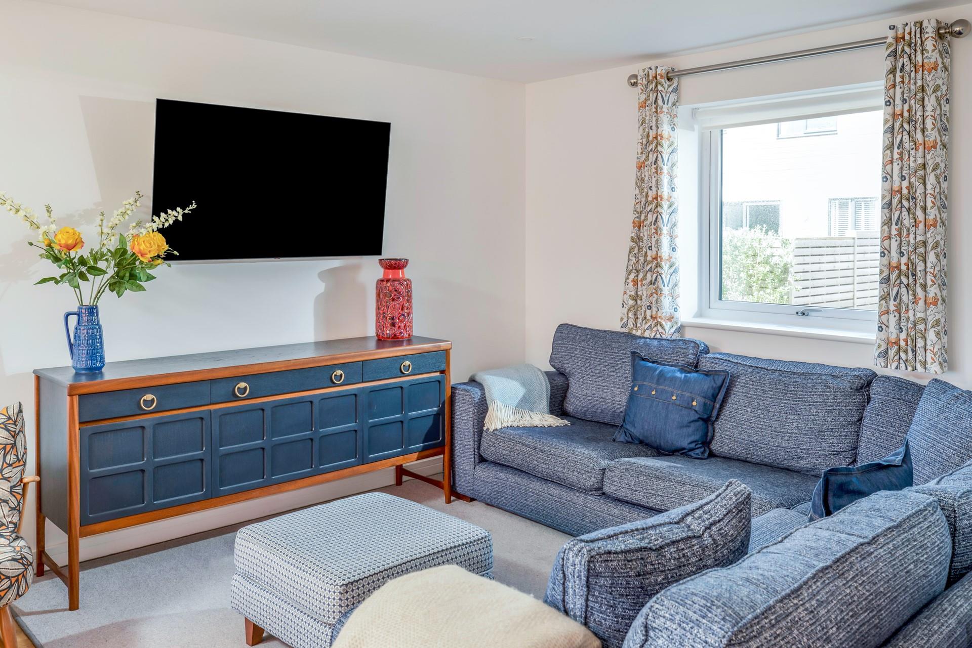 Put your feet up in the evening and enjoy a film with the family around you.