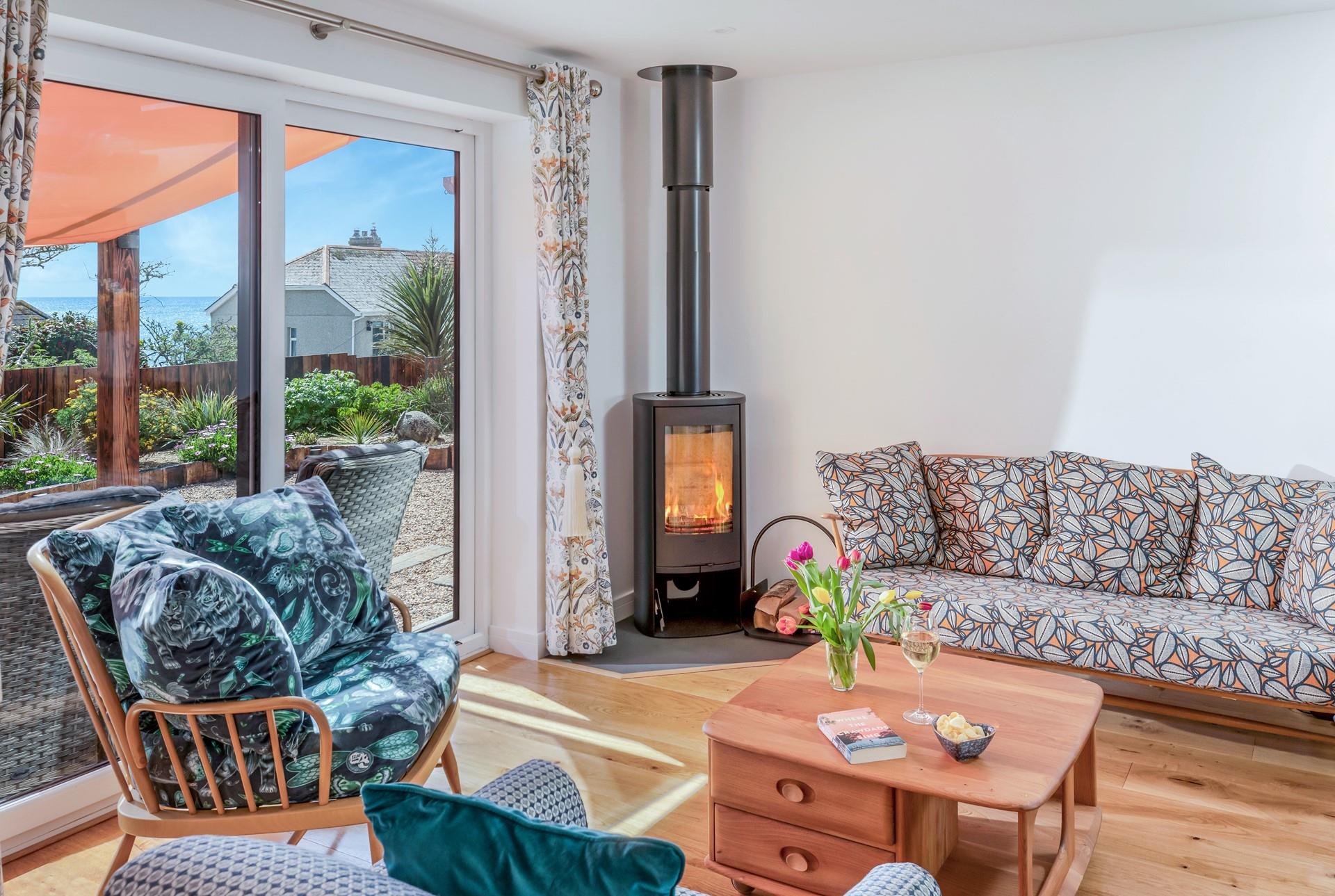 The woodburner provides a welcome return on chillier evenings.