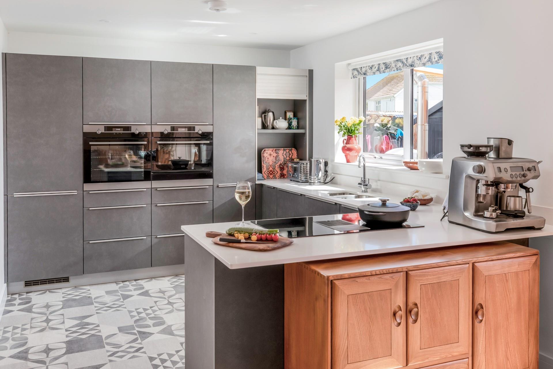 The kitchen is stylish and perfectly equipped for all family's needs.