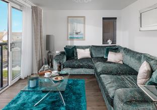 There's plenty of space on the sumptuous sofa for all the family to relax.