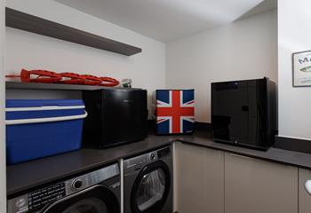 The utility has the added luxury of a beer and wine fridge!