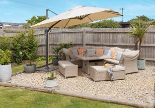 Unwind in the stylish garden with a chilled glass in hand.