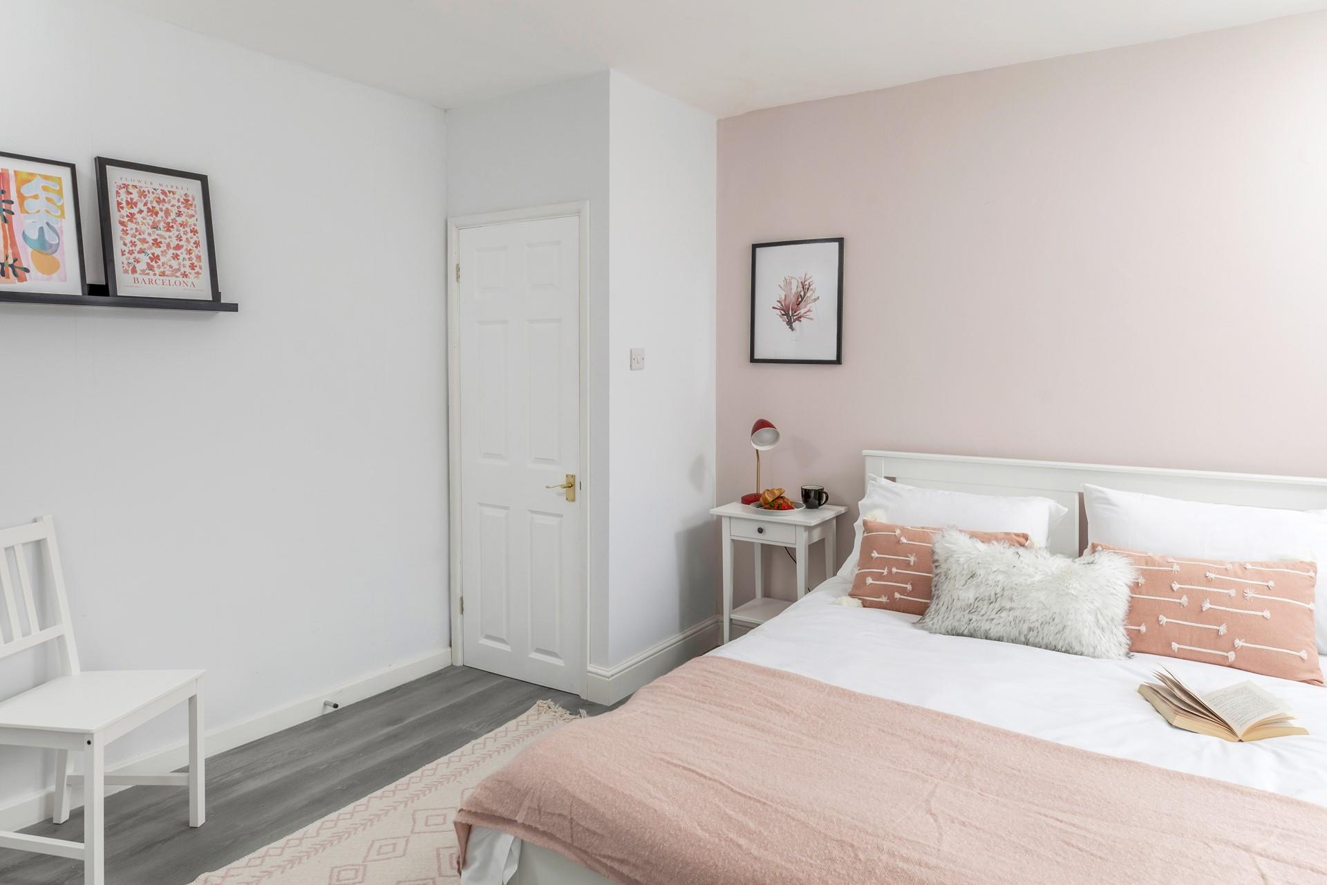 The spacious king size bed provides a dreamy night's sleep.