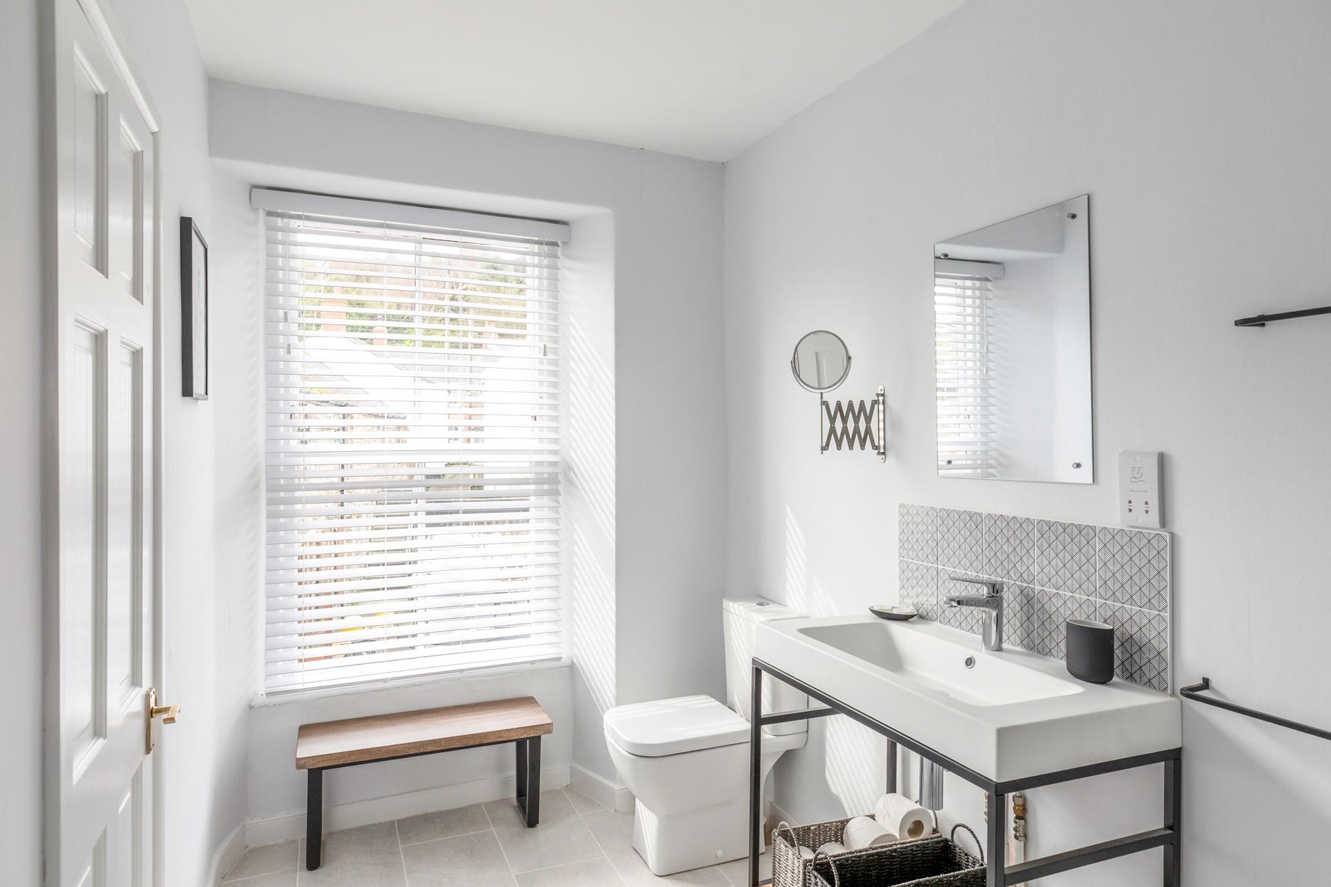 Get ready for the day in the en suite shower room.