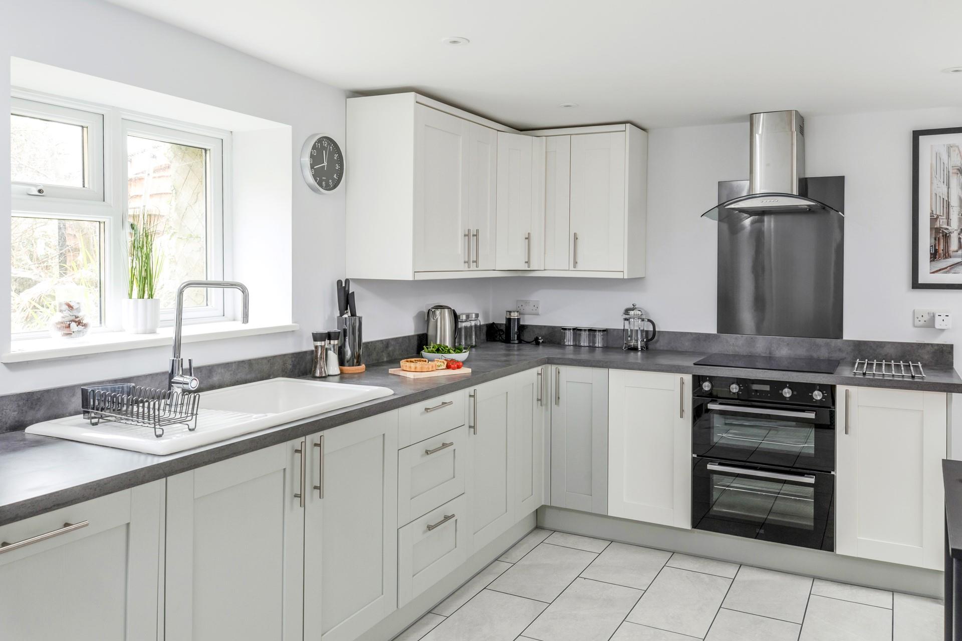 The large kitchen is well equipped for rustling up meals.