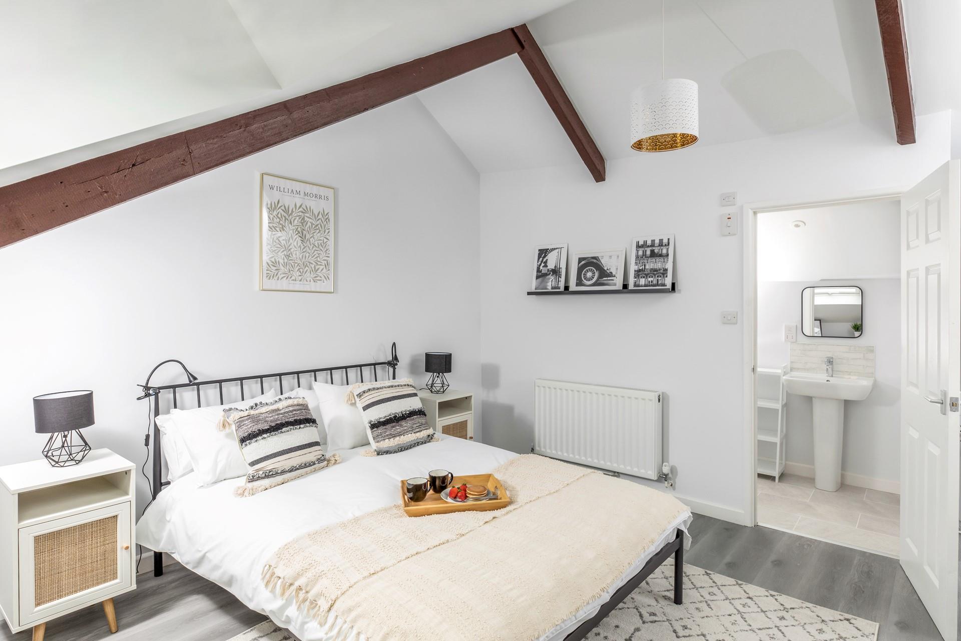 Bedroom 3 has a comfortable king size bed and en suite.